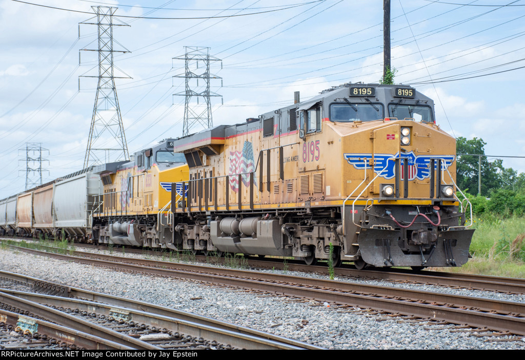 UP 8195 and another GE lead a train out of PTRA's North Yard 